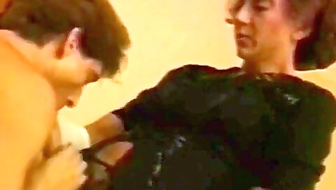 Mature stripper in a vintage sex show gets penetrated