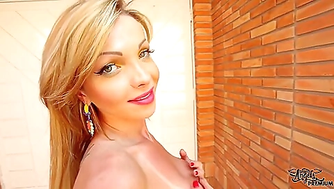 Amateur blonde with big boobs riding a large dildo