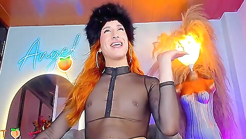 Busty redhead with natural tits and a big cock in bed