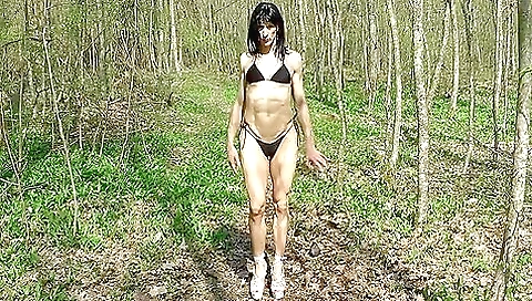 Amateur brunette ladyboy in outdoor clothes is showering