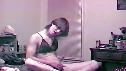 Sexy brunette with natural boobs in lingerie in a solo